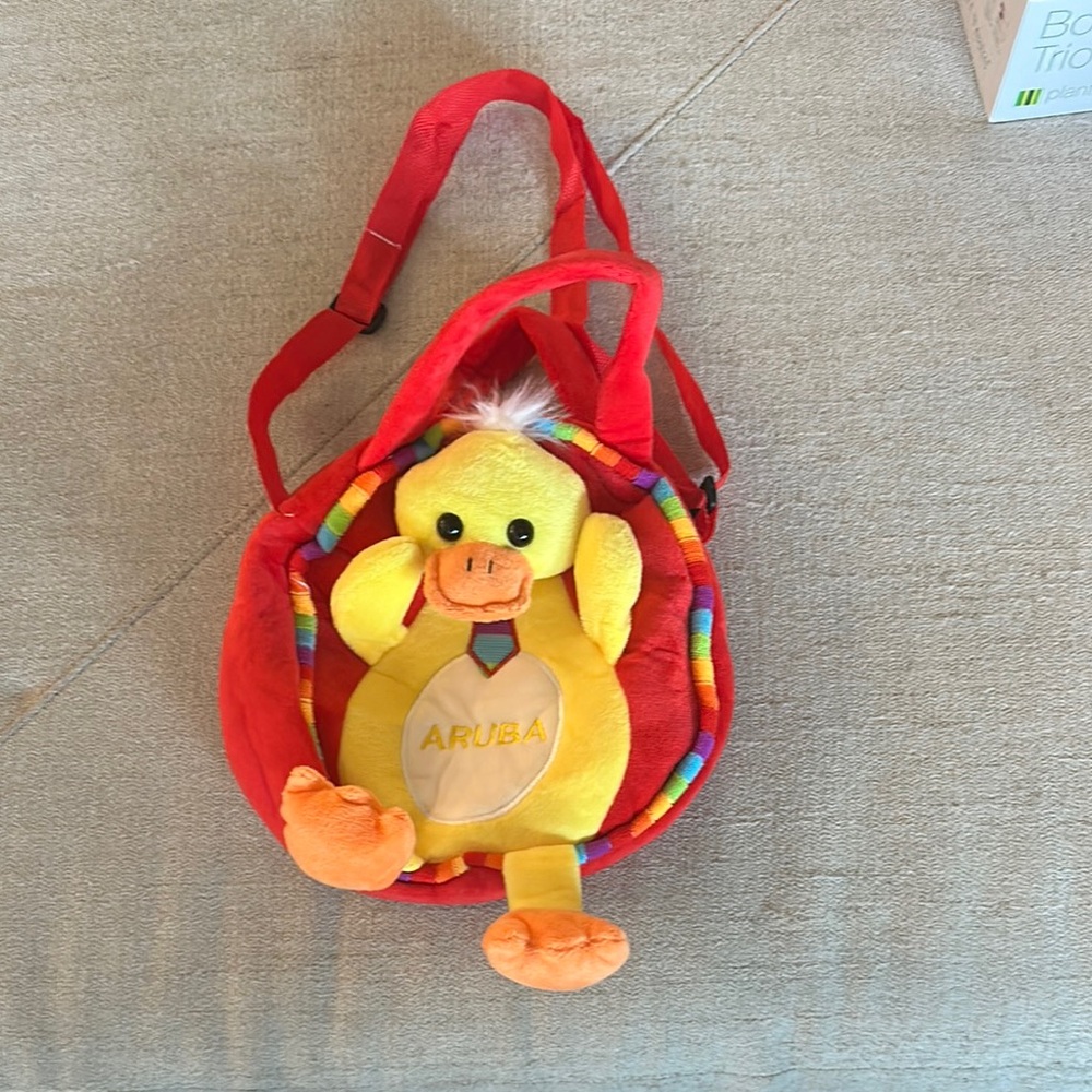 Red and Yellow Duck Plush Backpack from Aruba